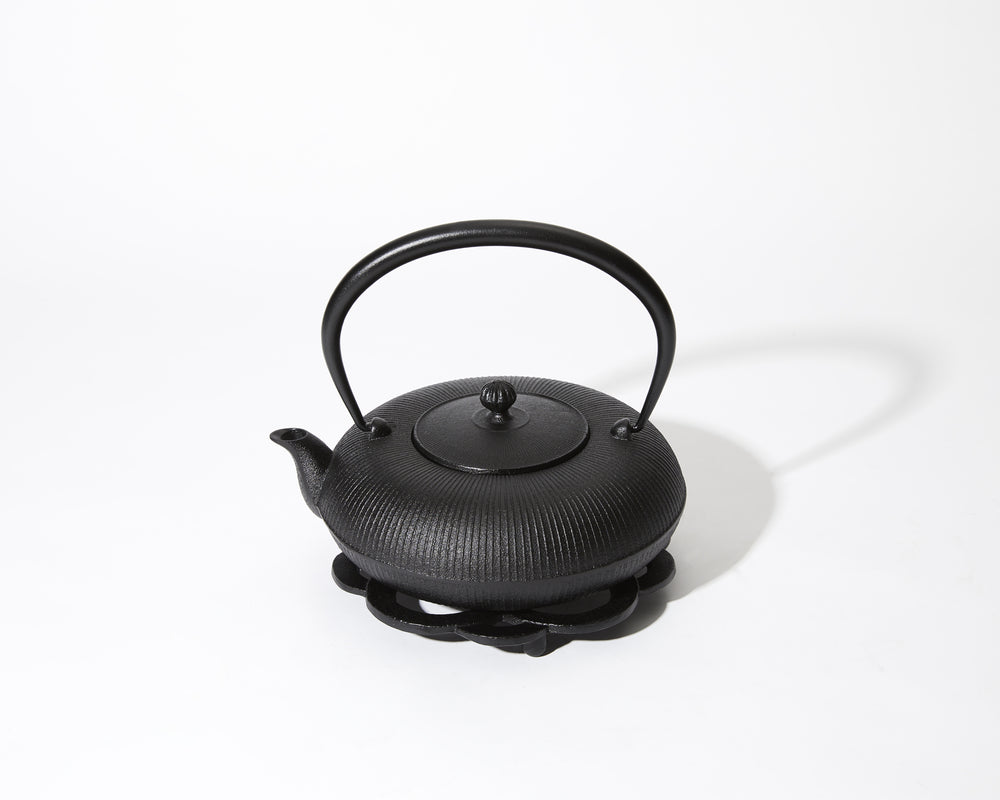 
                  
                    Nambu ironware pot stand, black, Hanamaru
                  
                